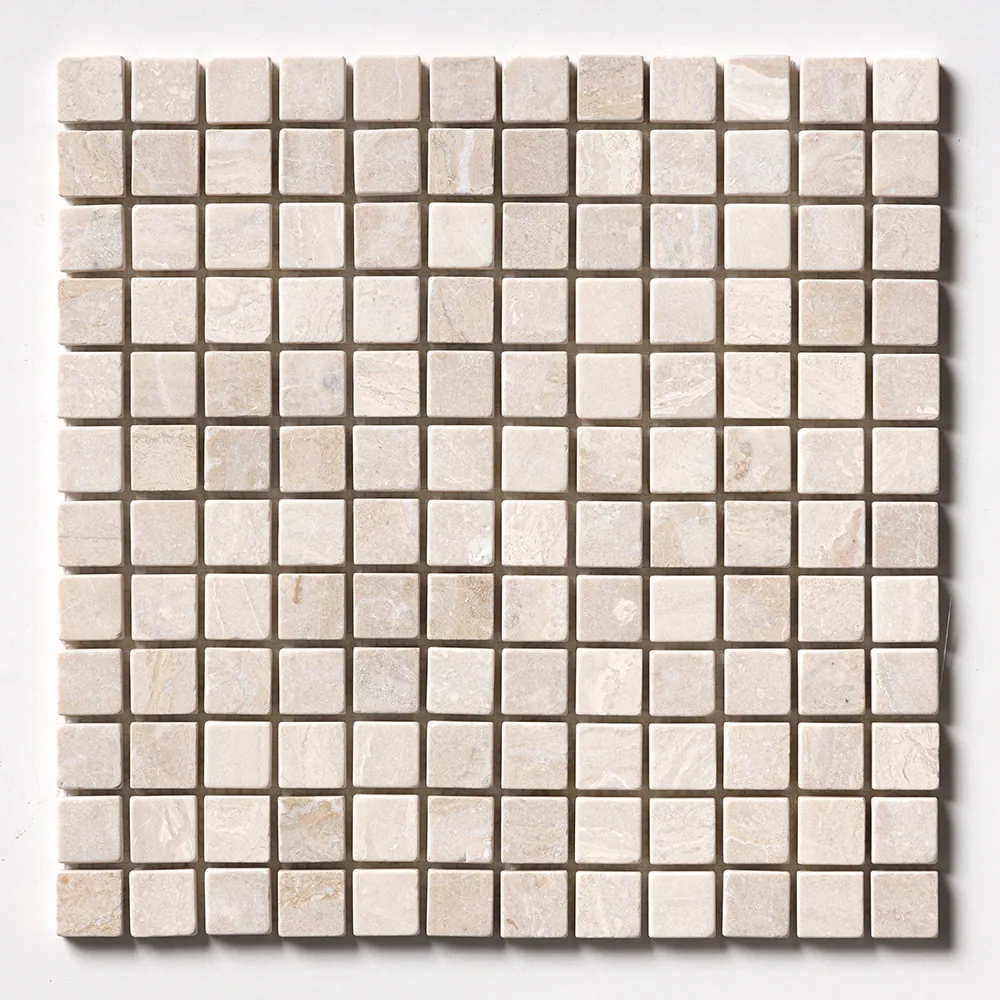 The tumbled one-inch grid straight on, its matt cream squares slightly irregular where the edges have been rounded.