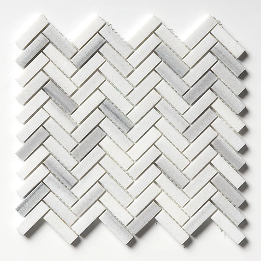 The full Frost White herringbone sheet straight on, mostly clean white with a scattering of pale grey-veined batons.