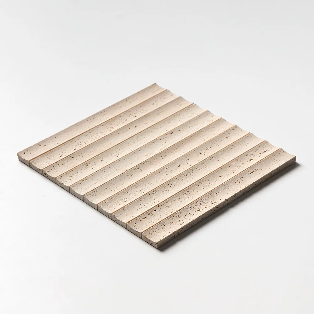 Ivory travertine panel cut into parallel rounded flutes, the ribbed surface angled so the ridges run diagonally across the frame.