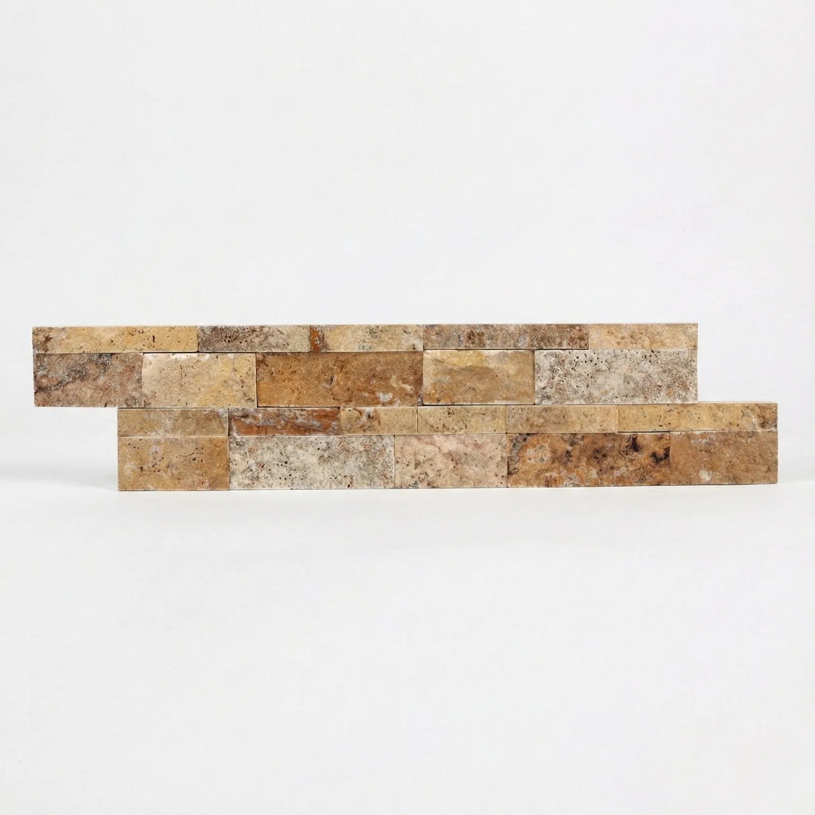 Scabos panel viewed close to frontally, showing the full spread of gold, rust and grey across the two courses.