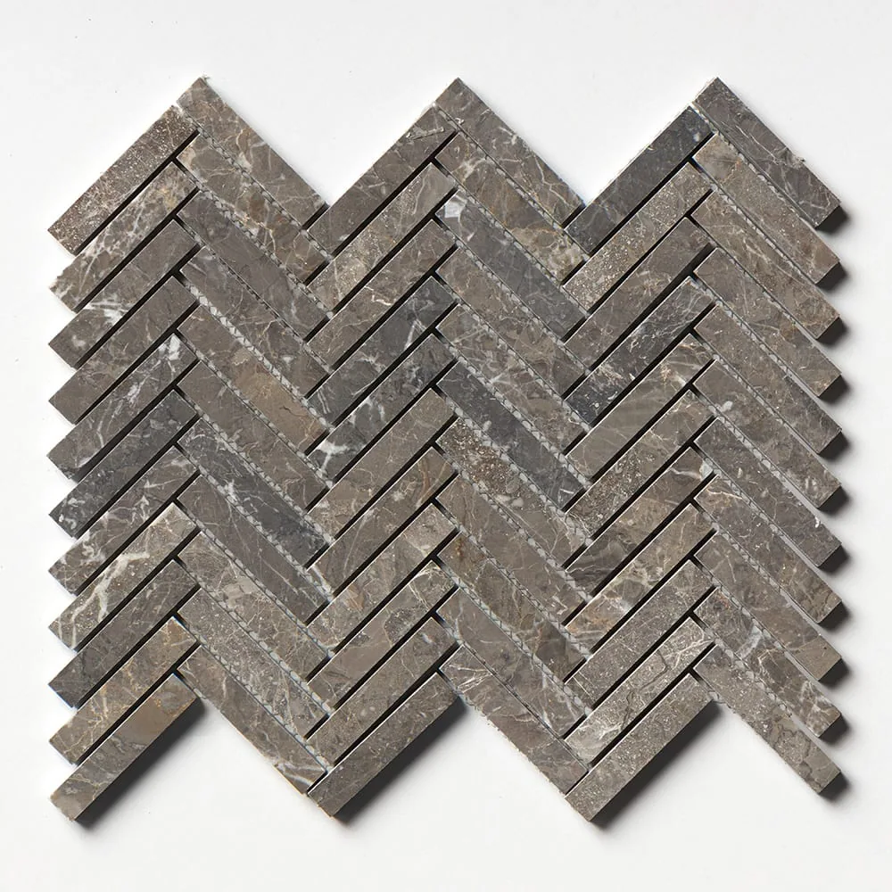 The full Silver Drop herringbone straight on, warm dark brown-grey marble crossed by fine white veining.