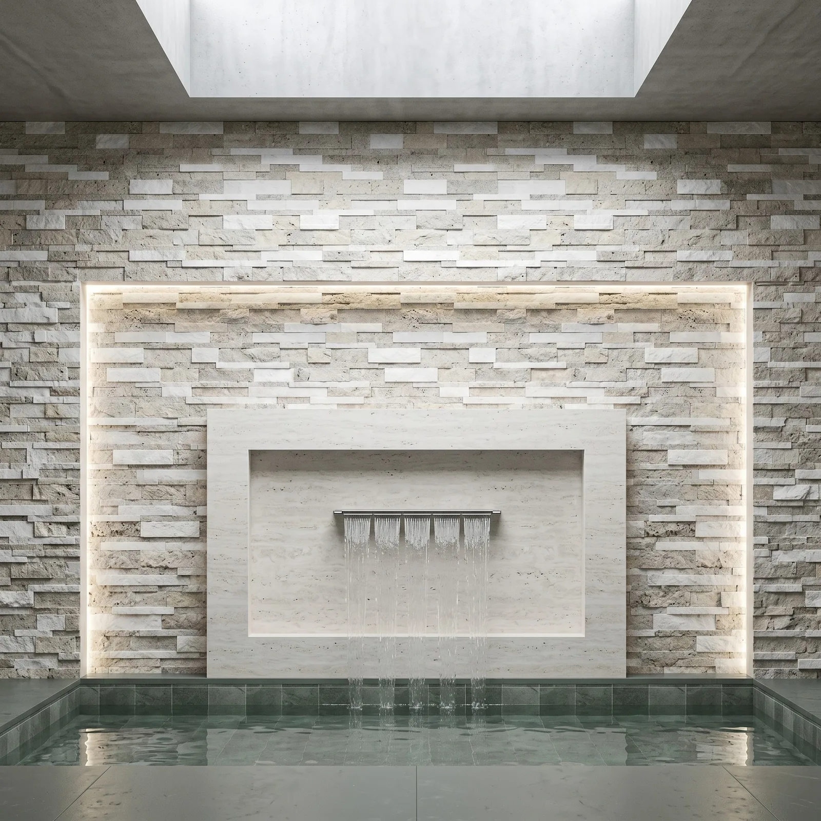 Indoor pool with a Silver White travertine ledger panel wall behind a recessed, lit water feature, daylight falling from a skylight above.
