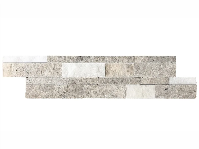 Silver White travertine ledger panel photographed square on against white: a single stepped run of split-face strips in cool grey and chalk white across two offset courses.