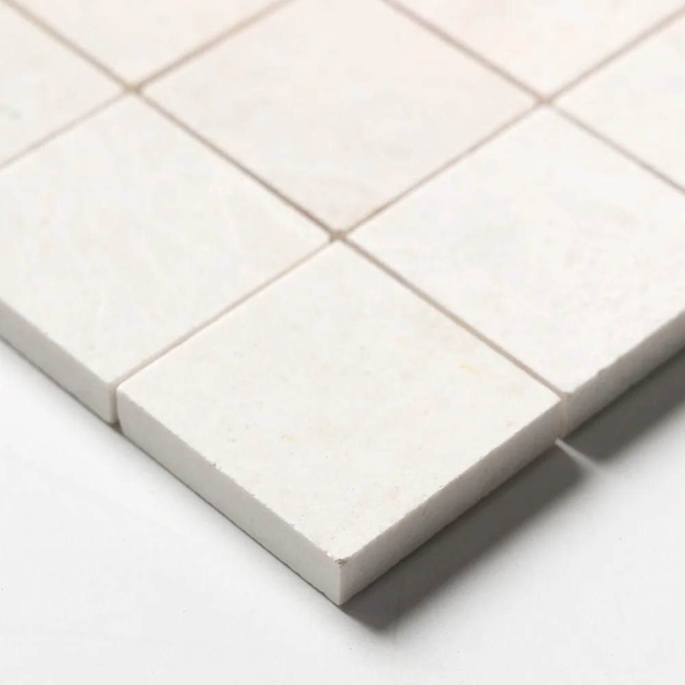 Close corner detail of the Vanilla sheet, showing the square edges, the sheet thickness and the stone's faint cream mottling.