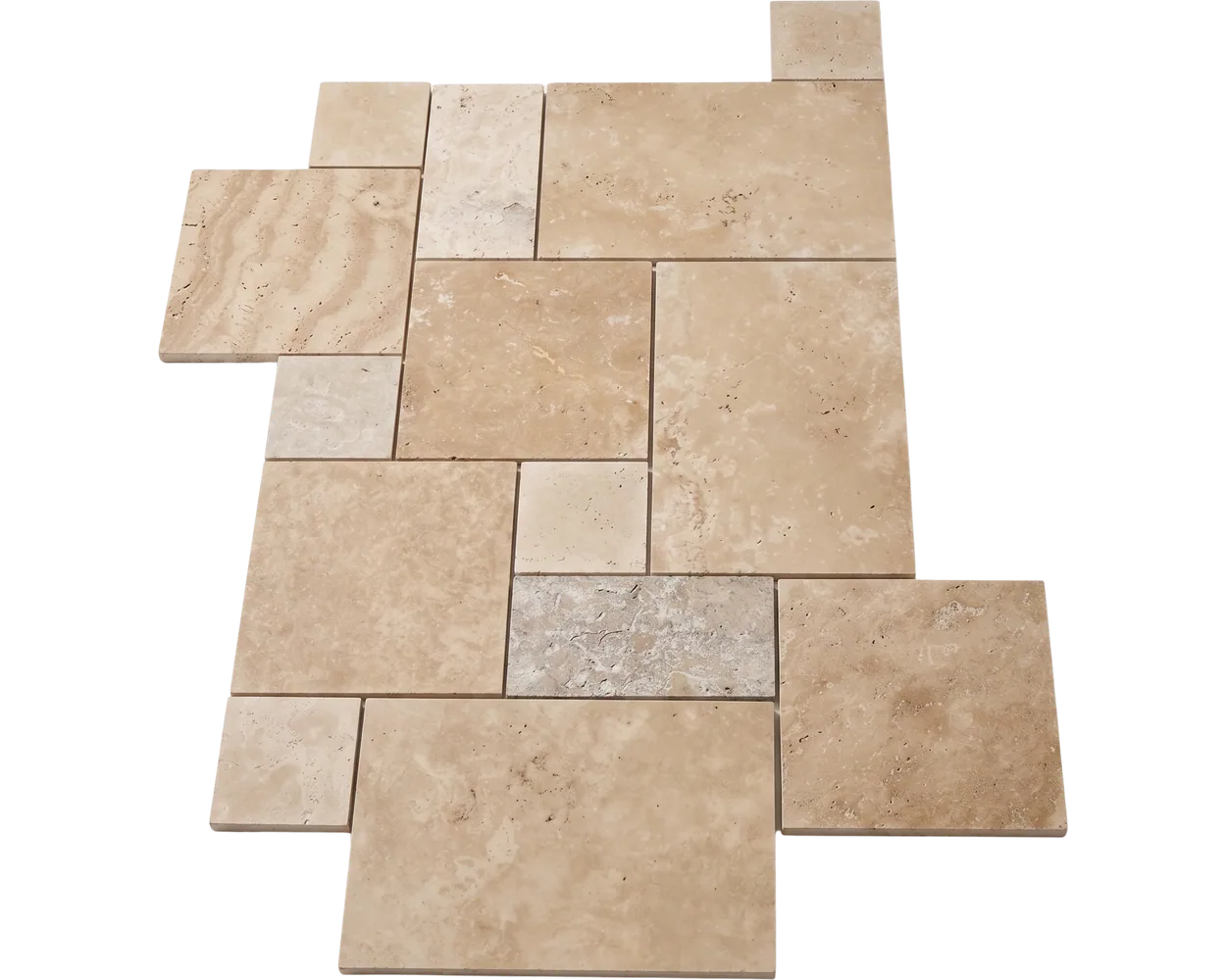 Travertine tile laid in a French pattern: warm cream and honey stone in four rectangular formats, the surface open and lightly pitted.